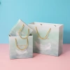 Ins-style handbags, clothing, cosmetics, shopping paper bags, tea packaging bags, birthday gift bags with logo printing details Picture
